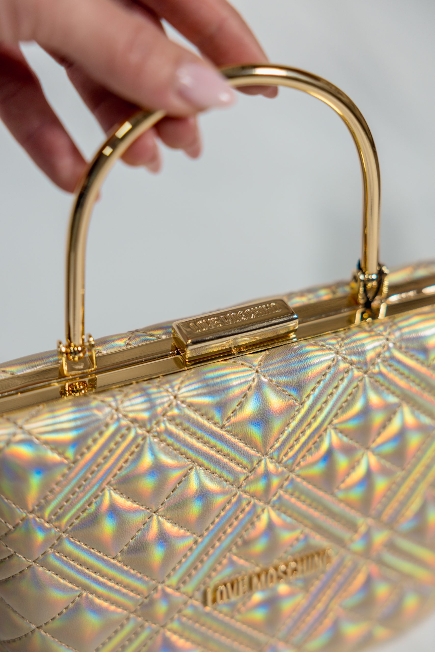 Borsetta rigida oro iridescente Love Moschino