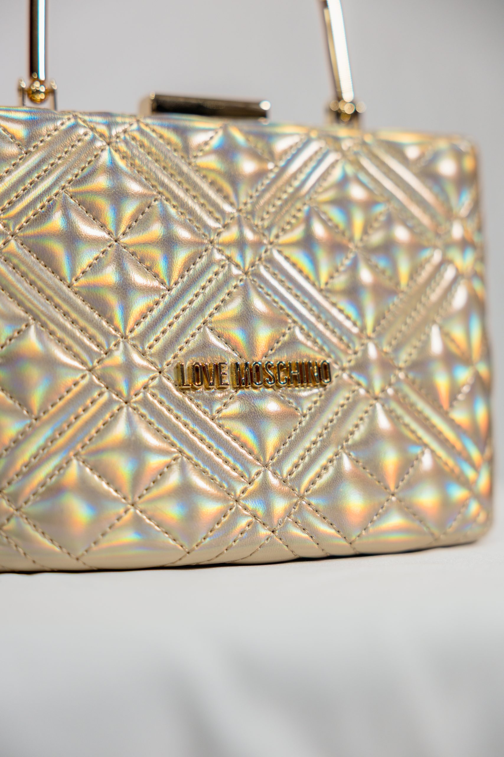 Borsetta rigida oro iridescente Love Moschino